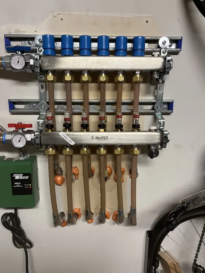 Plumber performing Water Heater Repair at a residential property in Frankstown